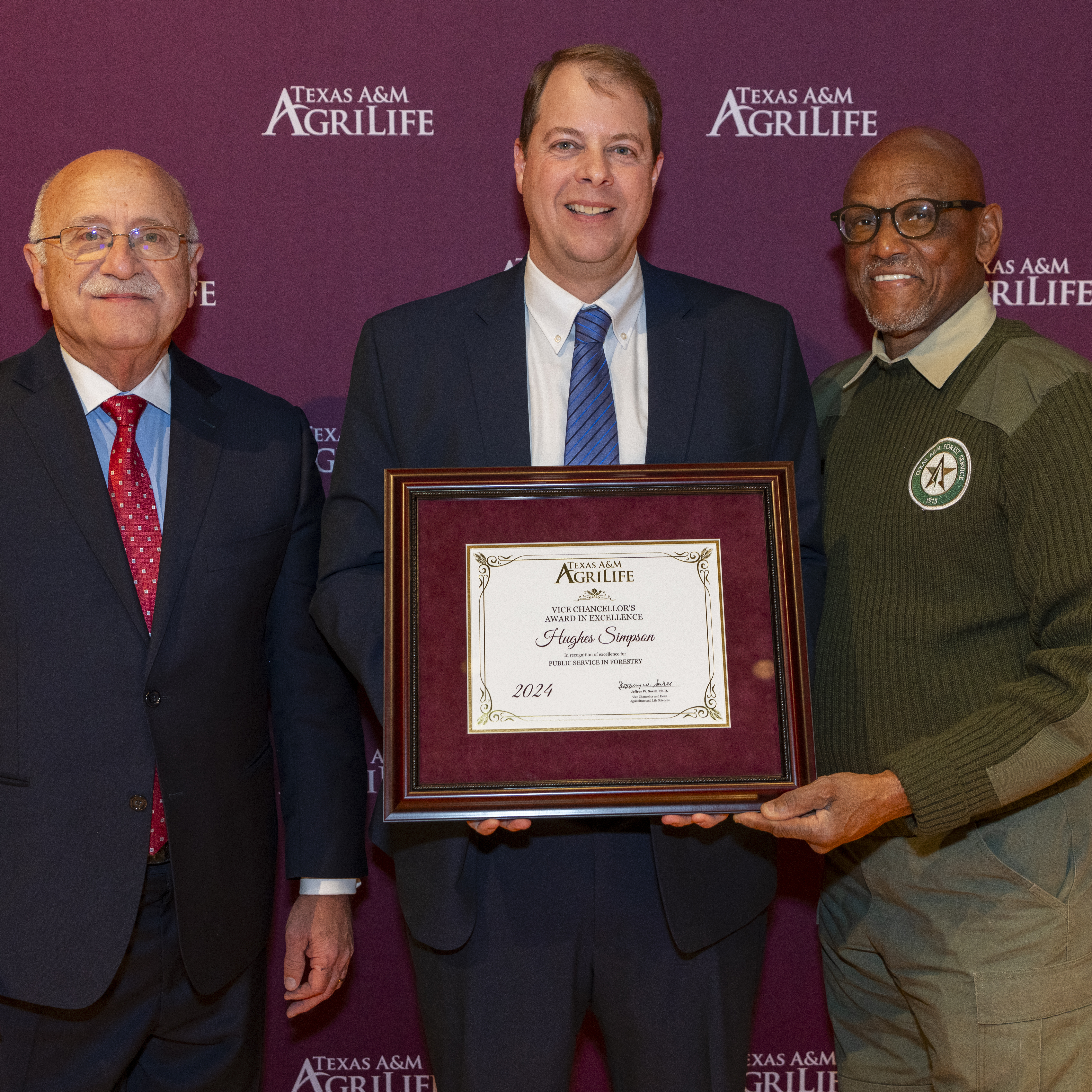 Hughes Simpson, Texas A&amp;M Forest Service Assistant Director, External Affairs, was presented the Public Service in Forestry Award by Texas A&amp;M University Vice Chancellor Dr. Jeffrey Savell, Wednesday, Jan. 8, 2025.